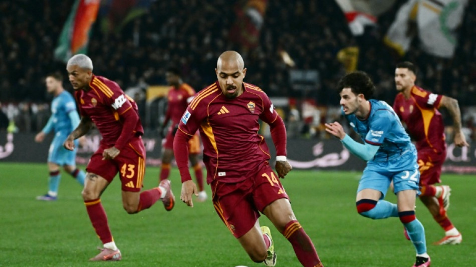 Malen double lifts Roma level with Juventus