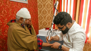 Fearing Indian police, Kashmiris scrub 'resistance' tattoos