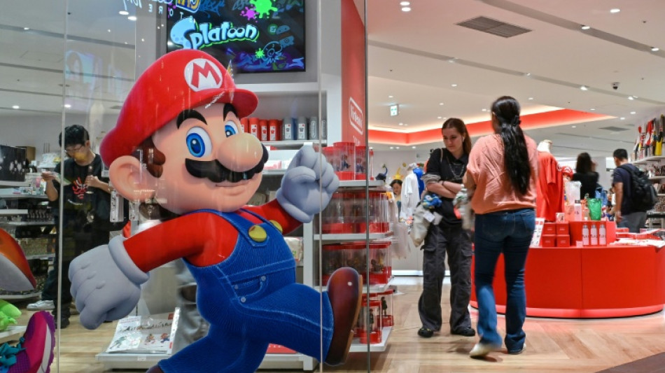 Gold nears $5,000, global stocks muted ending turbulent week