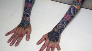 Rare woman yakuza on path to redemption in Japan