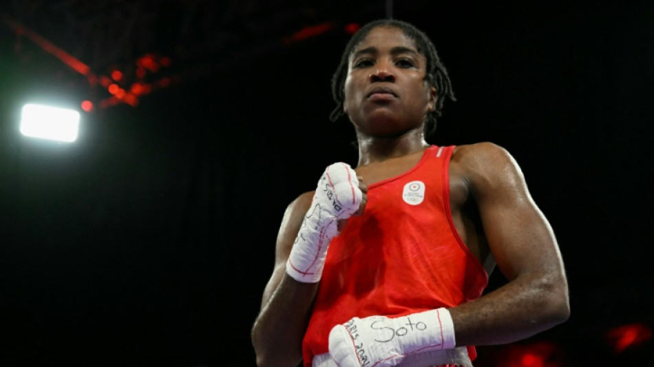 Boxeadora conquista primeira medalha da hist&oacute;ria da equipe ol&iacute;mpica de refugiados