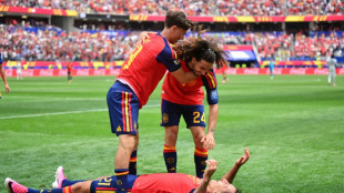 Spain power into last 16 at World Cup, Portugal face Croatia