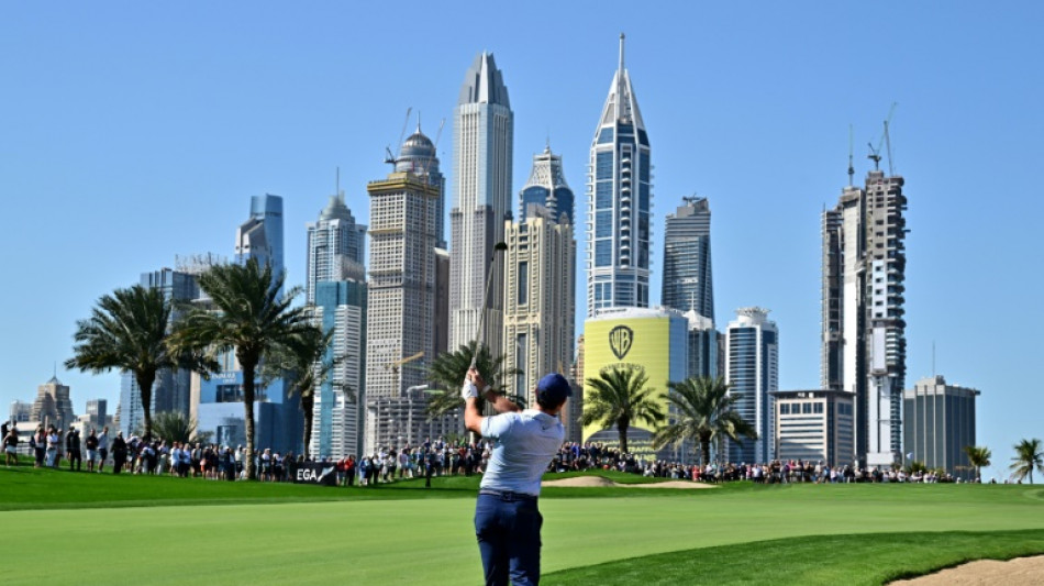 Molinari leads Dubai Desert Classic as McIlroy struggles