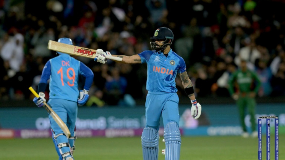 Kohli stars as India beat Bangladesh to stand on brink of T20 semi-finals