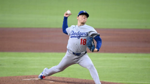 Dodgers beat Braves and Padres avoid sweep in MLB playoffs