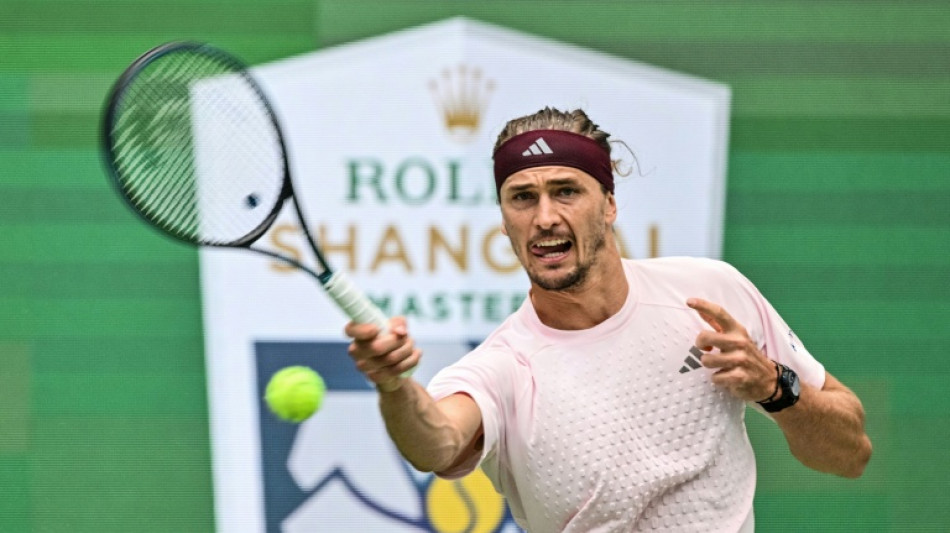 Top seed Zverev digs deep to reach Shanghai last 16
