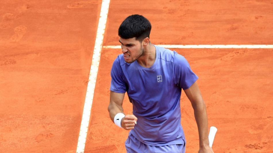 Alcaraz fights back against Fils to reach Monte Carlo semis