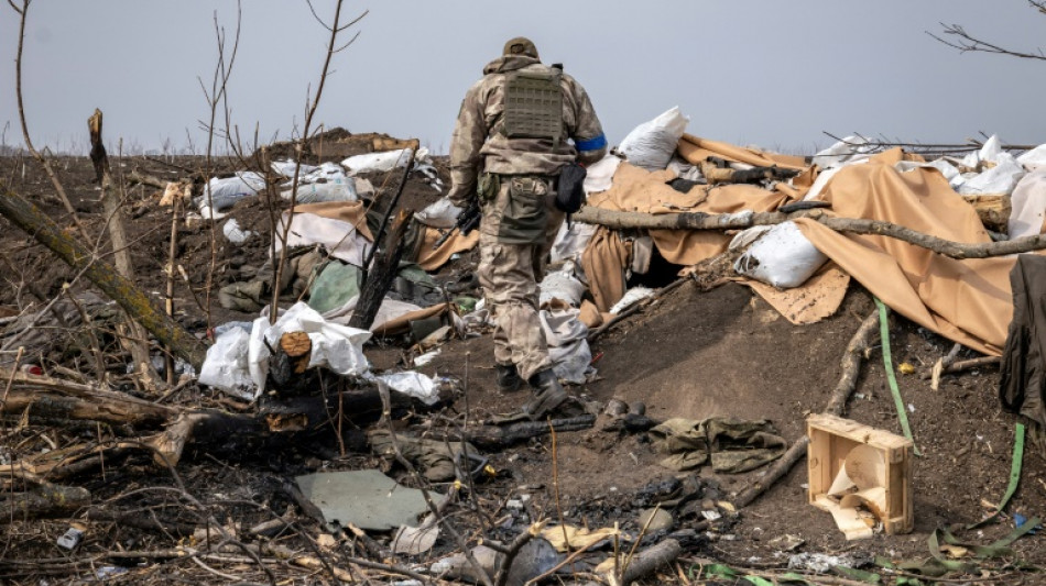 Ukraine sends evacuation buses to besieged city