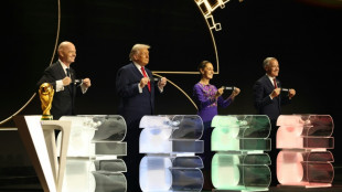 Peace medal and YMCA: Trump steals the show at World Cup draw