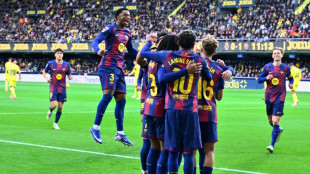Barca strengthen Liga lead at Villarreal, Atletico go third