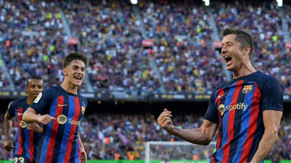 Lewandowski bags double for 'blessed' Barca, Benzema strikes late for Real 