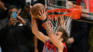 Lillard wins NBA 3-point title with unknown McClung Dunk king