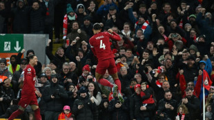 Liverpool tame Wolves to climb into top six