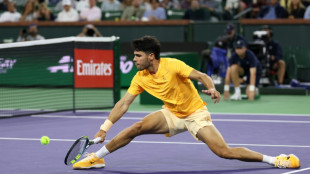Alcaraz battles back to reach Indian Wells fourth round