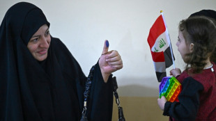 Iraqi voters turn out in numbers as region watches on