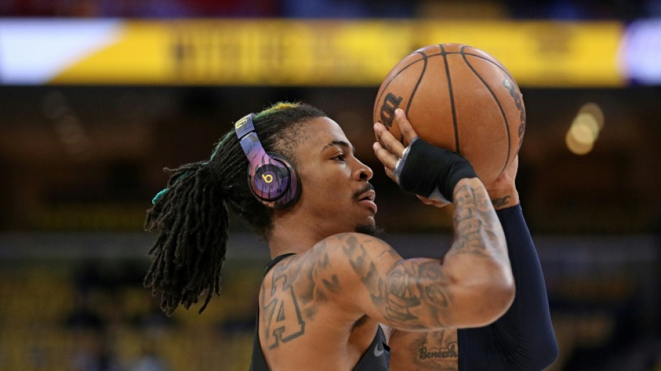 Grizzlies suspend Morant after new video with gun