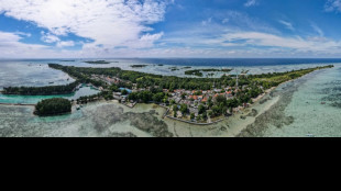 Activistas indonesios buscan justicia clim&aacute;tica frente a una cementera suiza