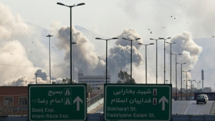 In Iran, shut shops, joblessness and a dash for cash