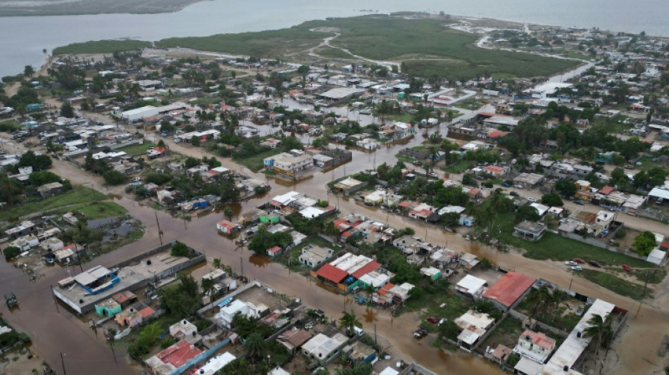 Hurricane Polo sweeps over Mexico's Pacific coast, heads inland