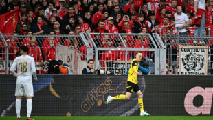 Dortmund beat Mainz to keep European hopes alive